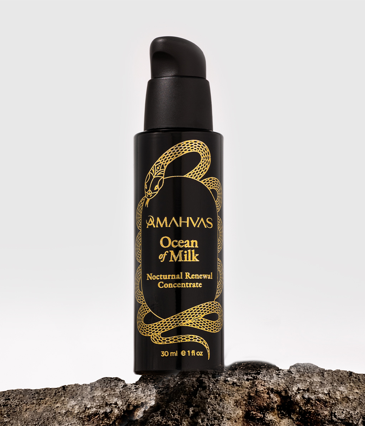 Amahvas Ocean of Milk Nocturnal Renewal Concentrate bottle on a gray background